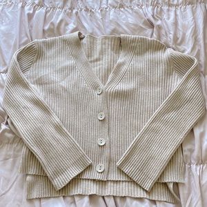This item is by Shein, the color is cream and is one size
